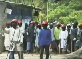  ??  ?? Extremists on Himandhoo during the raid