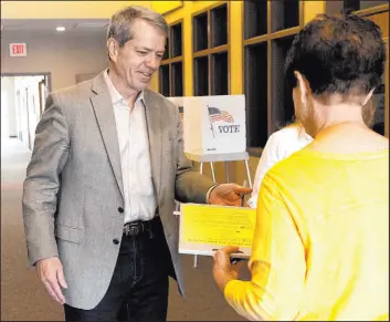  ?? Eileen T. Meslar The Associated Press ?? Jim Pillen, a hog farm owner and veterinari­an, won Nebraska’s crowded Republican primary for governor on Tuesday over a candidate endorsed by Donald Trump.