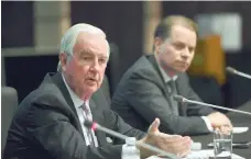  ?? — AFP ?? World Anti-Doping Agency President Craig Reedie (L) speaks as Wada Director General Olivier Niggli (R) looks on, in Seoul.