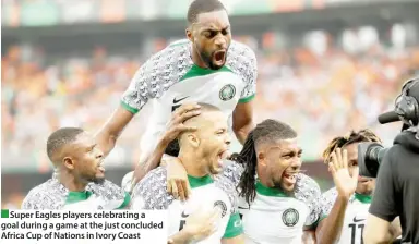  ?? ?? Super Eagles players celebratin­g a goal during a game at the just concluded Africa Cup of Nations in Ivory Coast