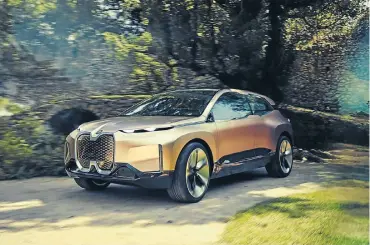  ??  ?? It’s unlike any BMW we’ve yet seen, with super-slim headlamps and a supersized kidney grille. Left: The homely interior will be more like a lounge than a car cabin.
