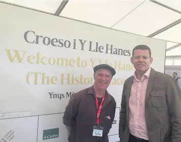  ??  ?? Rhys Mwyn and Rhun ap Iorwerth AM at the opening of Y Lle Hanes on the Eisteddfod Maes