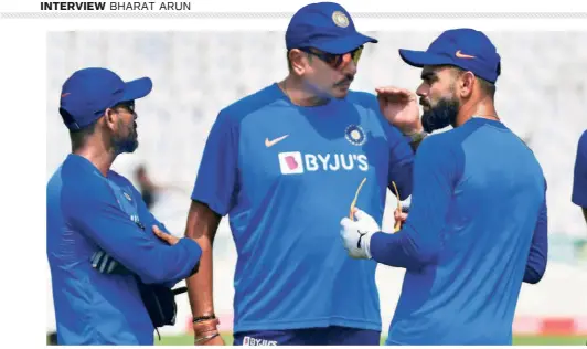  ?? THE HINDU PHOTO
LIBRARY ?? Teamwork: Arun with fielding coach R. Sridhar, head coach Ravi Shastri, skipper Virat Kohli, and batting coach Vikram Rathore in 2019. Arun is full of praise for Kohli. “Attitude is important. That’s where Kohli came in as a leader. He took the fight straight to the opposition; there are no words minced — he wanted to excel, and he wanted the team to excel with him,” he says.