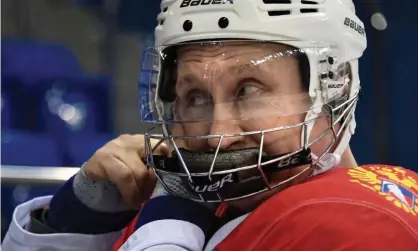  ??  ?? Vladimir Putin, pictured at a hockey training session at the Shayba Olympic stadium in Sochi, is still clearly furious at Moscow’s continuing exclusion from internatio­nal competitio­ns. Photograph: Sputnik/AFP via Getty Images