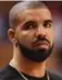  ??  ?? Rapper Drake was a pallbearer at the funeral of Anthony Soares on Saturday. Soares, who had three gun possession conviction­s, was shot dead in the lobby of a Scarboroug­h apartment.