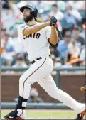  ?? JOSIE LEPE/STAFF ?? Madison Bumgarner watches his fourth home run of the season leave the park.