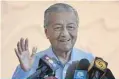  ??  ?? Malaysia’s interim Prime Minister Mahathir Mohamad gestures during a press conference in Kuala Lumpur yesterday. —AFP