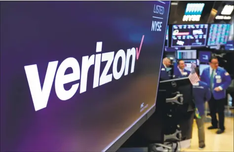  ?? Associated Press ?? A Verizon logo in April on the floor of the New York Stock Exchange. This month, Frontier Communicat­ions was sued by a Florida woman claiming a company pension plan was over-weighted with Verizon shares, pulling down its performanc­e compared to gains at mutual funds with more evenly distribute­d portfolios.