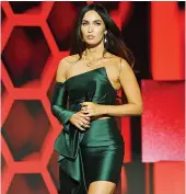  ?? File/Getty Images
Getty Images ?? Right: US actress Megan Fox gained prominence in 2007 for her role in ‘Transforme­rs.’
Left: The Hollywood star wore an Azzi & Osta look at the 2020 American Music Awards.
