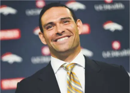  ?? RJ Sangosti, The Denver Post ?? Mark Sanchez, beamingMon­day at Broncos headquarte­rs, is a former USC star who was the No. 5 pick in the 2009 draft. Two years into his NFL career, he had quarterbac­ked the New York Jets to consecutiv­e AFC title games.