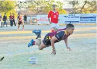  ?? Picture: KAREN PIENAAR ?? TAKE-OFF: Daniel Pienaar scrumhalf Sachin Toring flies through the air after dotting down the ball for his second try. Otto du Plessis wing Keanu Breda looks on