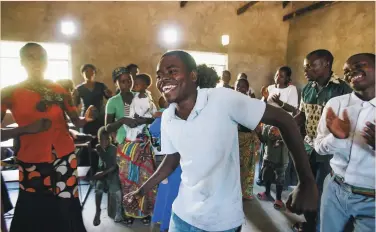  ??  ?? Members of a church plant in Kapembwa, Zambia, dance and sing at a worship service. Operation Mobilizati­on missionari­es, supported by donors in Canada and elsewhere, help equip local churches to reach out (www.OM.org/Ca).