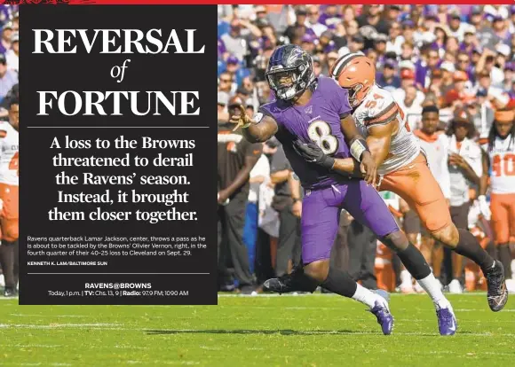  ?? KENNETH K. LAM/BALTIMORE SUN ?? Ravens quarterbac­k Lamar Jackson, center, throws a pass as he is about to be tackled by the Browns’ Olivier Vernon, right, in the fourth quarter of their 40-25 loss to Cleveland on Sept. 29.