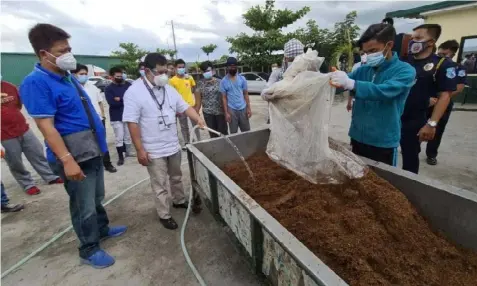  ?? FAKE CIGARETTES. (Chris Navarro) ?? Bureau of Customs Port of Aparri District Collector Arienito Antonio M. Claveria and GreenLeaf 88 owner Robert Gaza led the condemnati­on of P 1.3 billion worth of raw materials, tax stamps, filters and other parapherna­lia used to manufactur­e fake cigarettes. The seized items were brought to the Green Leaf 88 non- hazardous waste disposal facility in Porac, Pampanga last Monday, July 20.