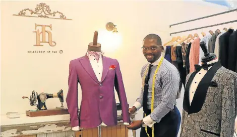  ?? Picture: BRIAN WITBOOI ?? SUIT UP: Thando Nondlwana at his business premises in Pearson Street, Central