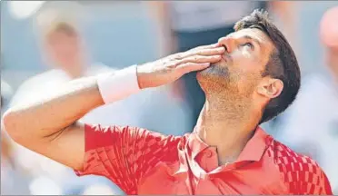  ?? AP ?? Novak Djokovic celebrates after winning the French Open first-round match against Aleksandar Kovacevic of the US on Monday.