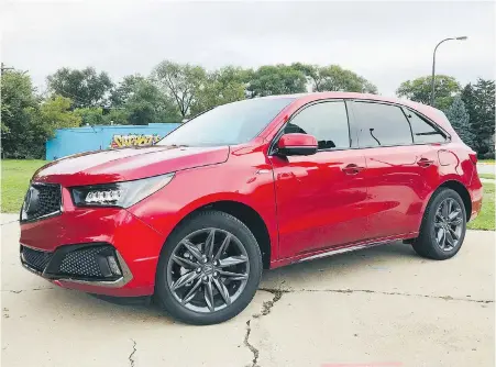 ??  ?? The A Spec trim on the MDX blacks out the chrome trim, has a new lower fascia and replaces 18-inch wheels with wider 20-inchers.