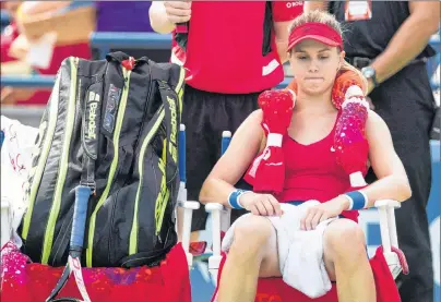  ?? CP PHOTO ?? Eugenie Bouchard of Canada sits in her chair between games against Donna Vekic of Croatia during their first-round match at the Rogers Cup WTA women’s tennis tournament in Toronto, Ont., Tuesday. The top female tennis players can relate to Bouchard’s...