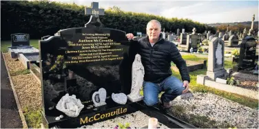  ?? PA ?? Michael McConville, son of IRA murder victim Jean McConville, at his parents’ grave in Lisburn