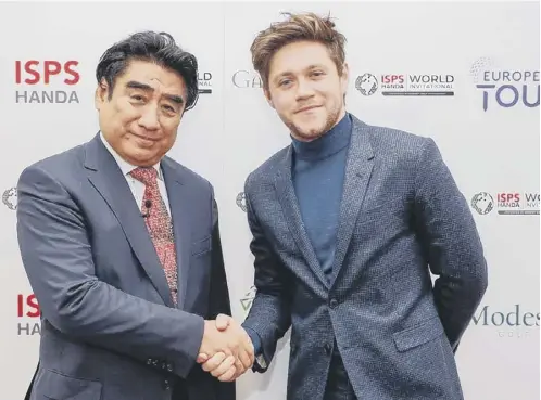  ??  ?? ISPS HANDA founder and chairman Dr Haruhisa Handa, left, with Modest! Golf Management owner Niall Horan