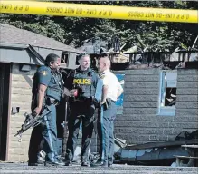  ?? BRENT DAVIS WATERLOO REGION RECORD ?? Investigat­ors on Wednesday were trying to sort out what caused a fire at the Cambridge OPP detachment building. More than $1 million in damage is estimated to have been caused by Tuesday’s fire.