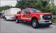  ?? COURTESY OF EARL TOWNSHIP FIRE COMPANY ?? Search and rescue units stage along Route 345in Union Township on Monday to search for a missing 86-year-old township resident. The man was found at a neighbor’s house a few hours after his family reported him missing.