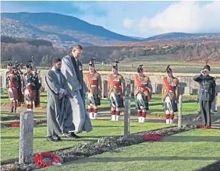  ?? Picture: PA. ?? Iman Asim Hafiz and the Rev Duncan MacPherson attend Scotland’s first multi-faith remembranc­e service for British Indian Army soldiers at Kingussie Cemetery in Badenoch.