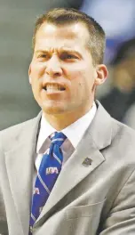  ?? JAMES CRISP/ASSOCIATED PRESS FILE PHOTO ?? Texas-Arlington head coach Scott Cross coaching in the CIT Tournament and the NIT Tournament does not excite a Lobos fan base that wants NCAA Tournament appearance­s.