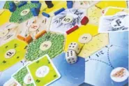  ?? GETTY IMAGES ?? More than 18 million copies of Settlers of Catan have been purchased since its release in 1995. In 2015, the mulitplaye­r board game underwent a rebrand, and the company changed the name to just Catan.
