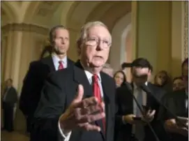  ?? ASSOCIATED PRESS ?? Senate Majority Leader Mitch McConnell, R-Ky., joined at rear by Sen. John Thune, R-S.D., tells reporters that he has spoken to President Donald Trump and other leaders about the Alabama Senate race and the allegation­s of sexual misconduct against GOP...