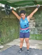  ?? Photo: Henry Elder ?? Weightlift­ing Fiji rep, Merewalesi Vusonitoka­lau training at the Elders home, where she resides .