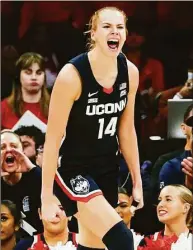  ?? Frank Franklin II / Associated Press ?? UConn’s Dorka Juhasz (14) celebrates after scoring during the first half against St. John’s on Wednesday.