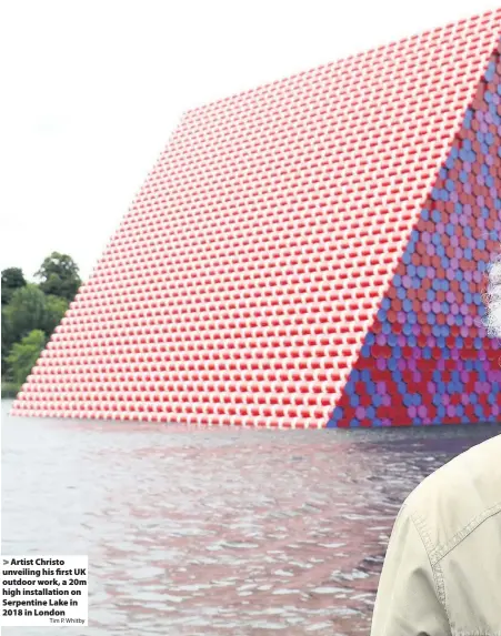  ?? Tim P. Whitby ?? Artist Christo unveiling his first UK outdoor work, a 20m high installati­on on Serpentine Lake in 2018 in London