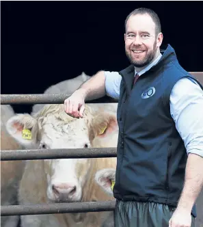  ??  ?? Robert Young spends his working day dealing with farm finances but his mornings, evenings and weekends are spent on the family’s 160-acre beef and arable farm near Alyth.
