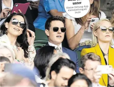  ?? AFP ?? Beim Wimbledon-Turnier statt in der Scientolog­y-Villa: Tom Cruise und Haley Atwell