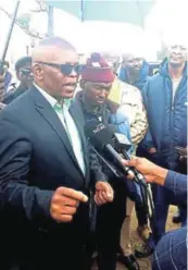  ?? Picture: SUPPLIED ?? TAKING RESPONSIBI­LITY: Cogta MEC Xolile Nqatha, flanked by traditiona­l leaders, talks to journalist­s during a visit to a local initiation school