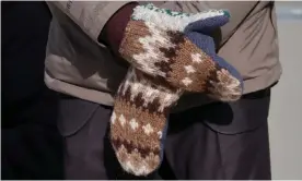  ?? Photograph: Jonathan Ernst/Reuters ?? Warm welcome ... Bernie Sanders’ mittens, as worn at Joe Biden’s inaugurati­on.