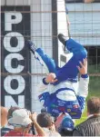  ?? MORNING CALL FILE PHOTO ?? Carl Edwards does a backflip after winning the Pocono 500.