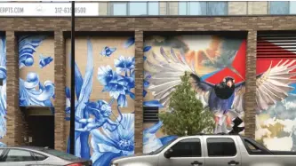  ??  ?? ABOVE: The new mural at 855 W. Madison St. features a magpie, which is an intelligen­t bird, and natureinsp­ired images.