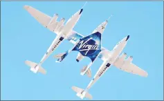  ??  ?? Virgin Galactic rocket plane, the WhiteKnigh­tTwo carrier airplane, with SpaceShipT­wo passenger craft takes off from Mojave Air and Space Port in Mojave, California, US. — Reuters photo