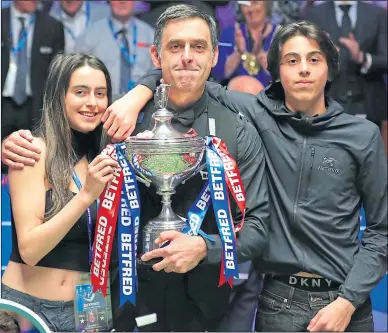  ?? ?? Ken Doherty (inset) was delighted to see Ronnie O’sullivan celebrate his seventh world title with his family at The Crucible