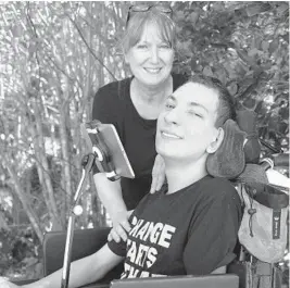  ?? T RICARDO RAMIREZ BUXEDA/ ORLANDO SENTINEL ?? JJ Holmes, 17, with his mom Alison outside their Longwood home, on Oct. 13. JJ has cerebral palsy and uses a wheelchair and an iPad that he types with his nose to communicat­e. He cannot wear a mask and use his device. Because he is at higher risk of COVID-19 complicati­ons, he cannot attend Lake Mary High School, where he’d be in 11th grade, if everyone else is not masked.