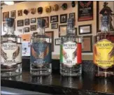  ?? SUBMITTED PHOTO ?? Several products from Five Saints Distilling and Internatio­nal Spirits in Norristown have won awards at multiple competitio­ns. At left, the distillery’s vodka, white whiskey, gin and blood orange liqueur.