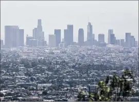  ?? Christina House Los Angeles Times ?? THE DOWNTOWN Los Angeles skyline. The American Lung Assn. said Monday that it planned to sue the Trump administra­tion for violating the Clean Air Act.