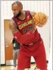  ?? TIM PHILLIS — THE NEWS-HERALD ?? LeBron James said he’ll deal with free agency next summer during Cavaliers media day on Sept. 25 in Independen­ce.