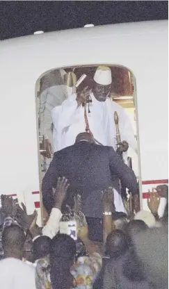  ?? PICTURE: AP ?? 0 Gambia’s defeated leader Yahya Jammeh waves to supporters as he departs Banjul airport on Saturday