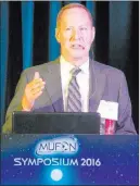  ??  ?? Sunshine Photograph­ics Mutual UFO Network executive director Jan Harzan speaks during the 2016 MUFON symposium in Orlando, Florida.