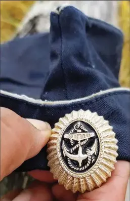  ?? Photo by Tiffany Slwooko ?? RUSSIAN SAILOR CAP— This cap was found Sept. 14, 2020 at Ivgaq, about five miles west of Savoonga, St. Lawrence Island.