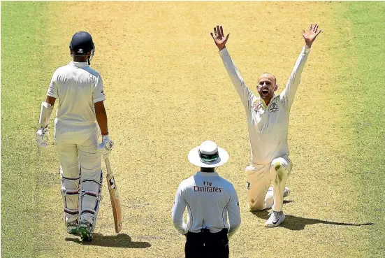  ?? GETTY IMAGES ?? Australian spinner Nathan Lyon appeals for the wicket of Indian batsman Rishabh Pant during the first day of the first test in Adelaide.