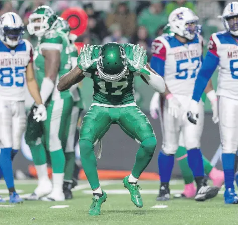  ?? MICHAEL BELL ?? Roughrider­s defensive back Crezdon Butler celebrates one of his two sacks on Friday against the Alouettes.